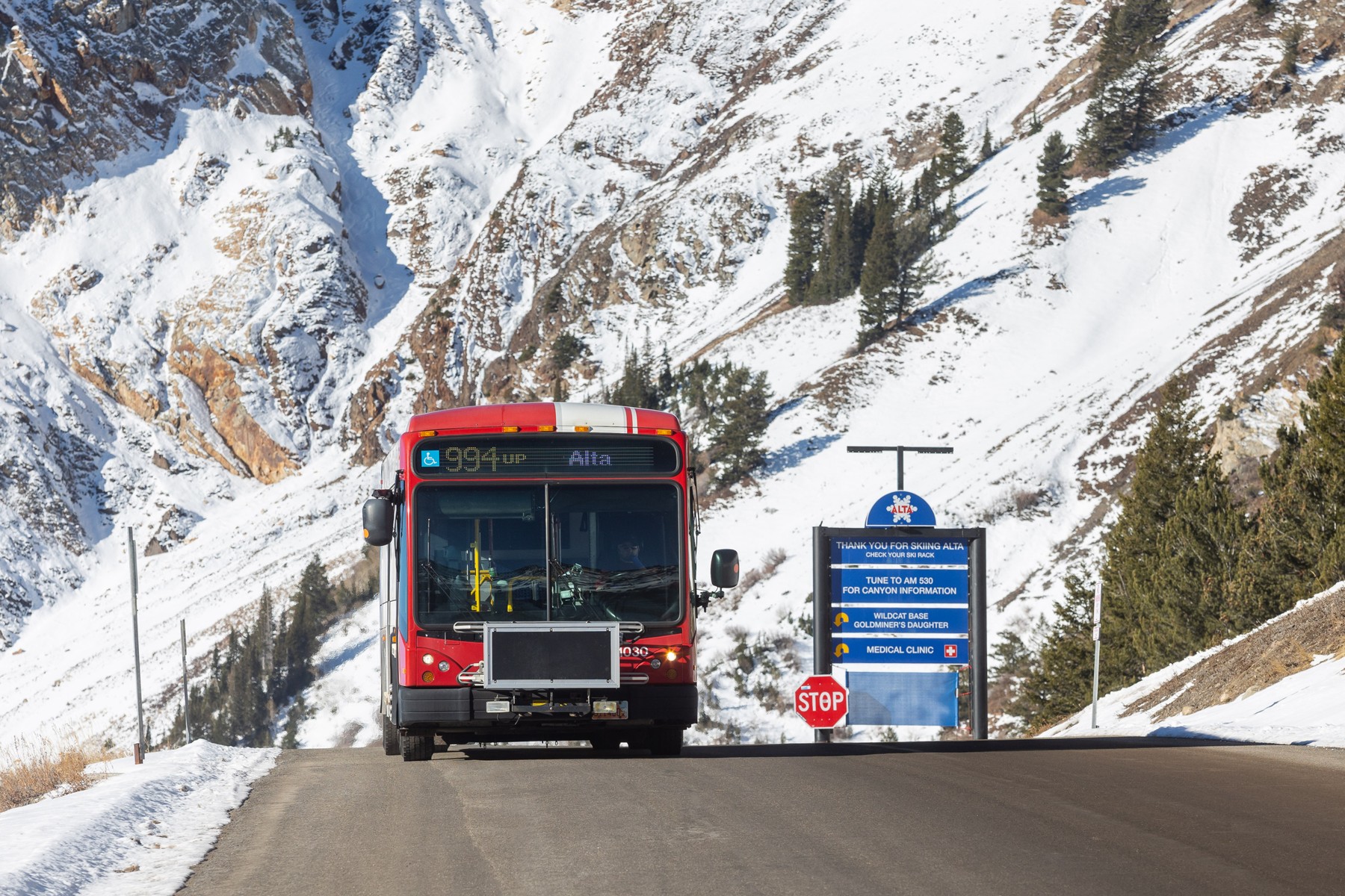 The 994 UTA ski bus arrives at Alta's Wildcat base parking lot.