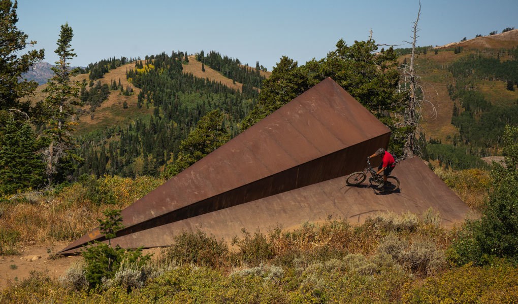 Riding the Paper Airplane Sculpture