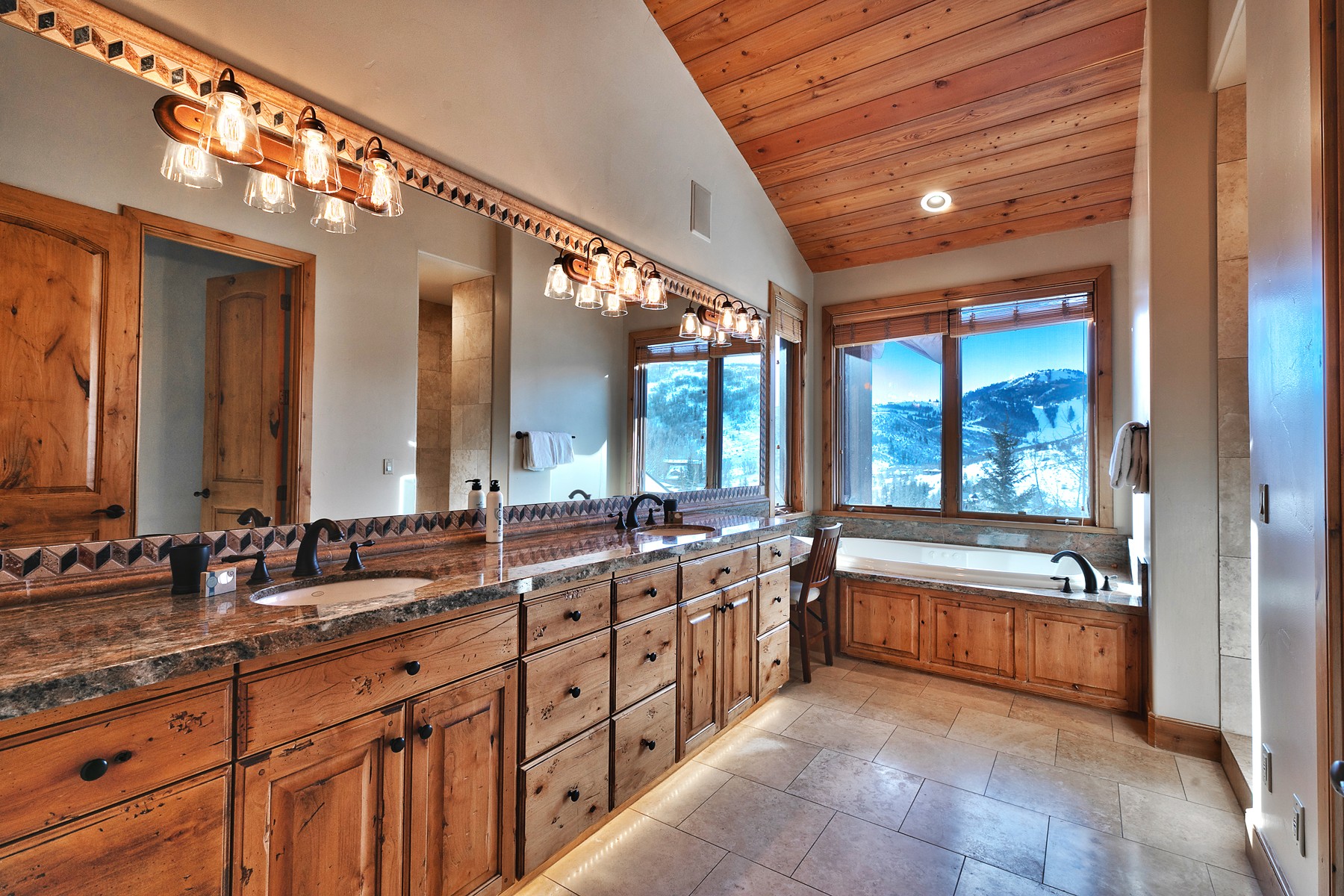 Spacious Bathrooms with Walk-in Showers and Jetted Tubs